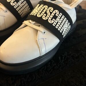 Moschino White Leather Sneakers with Black Logo worn once great condition.
